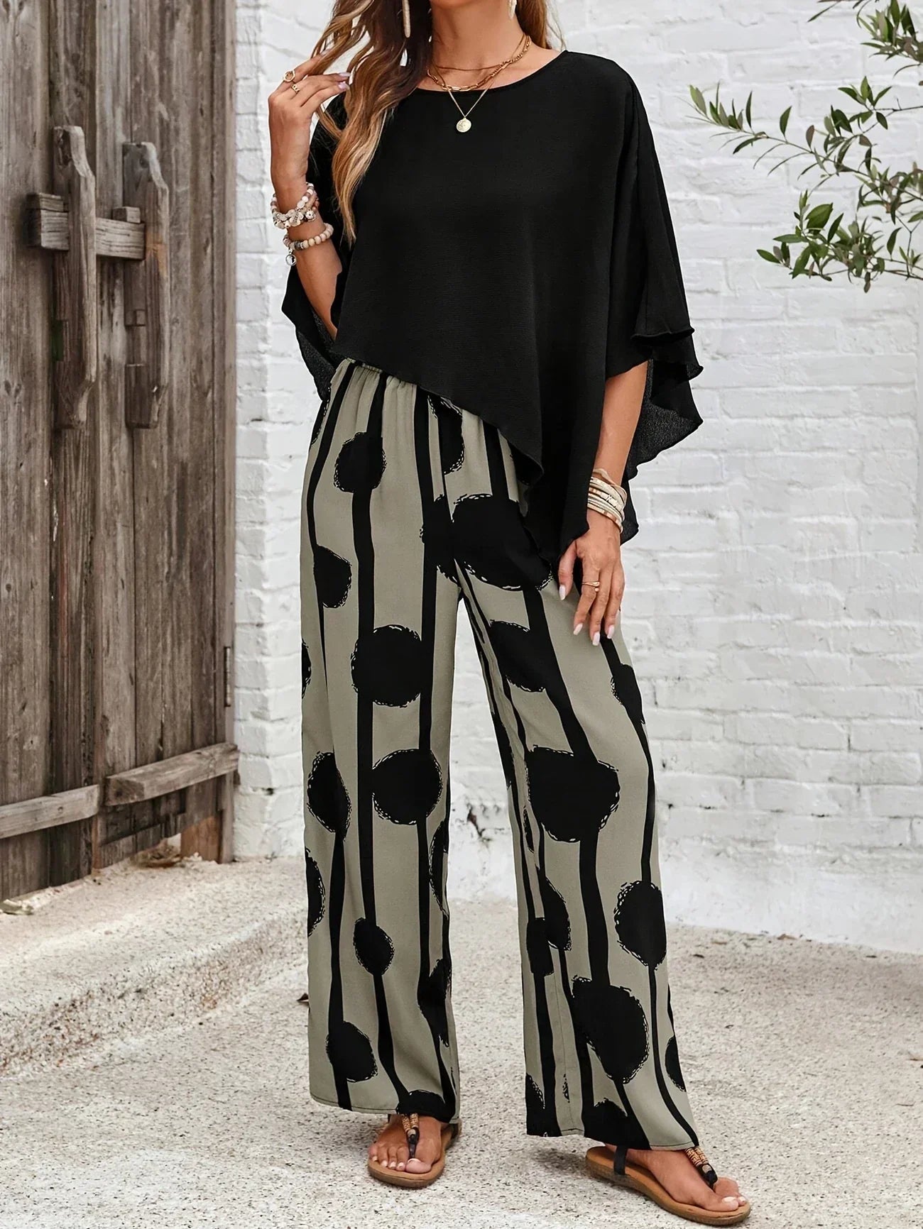 Dames Set met Asymmetrische Top en Bedrukte Broek